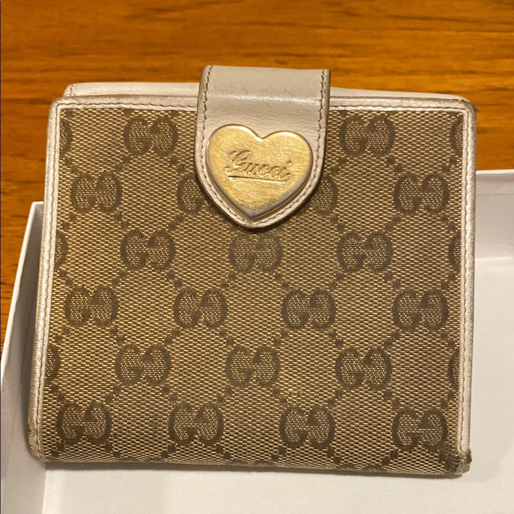 Gucci Tan  Monogram Wallet with creme leather with gold heart . 5 x5